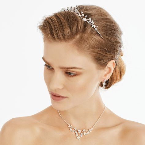 Classical style tiara embellished with glistening rhinestones and crystals.